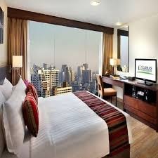 Spacious hotel room with city view at Lohas Residence Bangkok